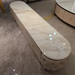 Cream Tufted Leather TV Stand with Oval Marble Top and Dark Glossy Frame